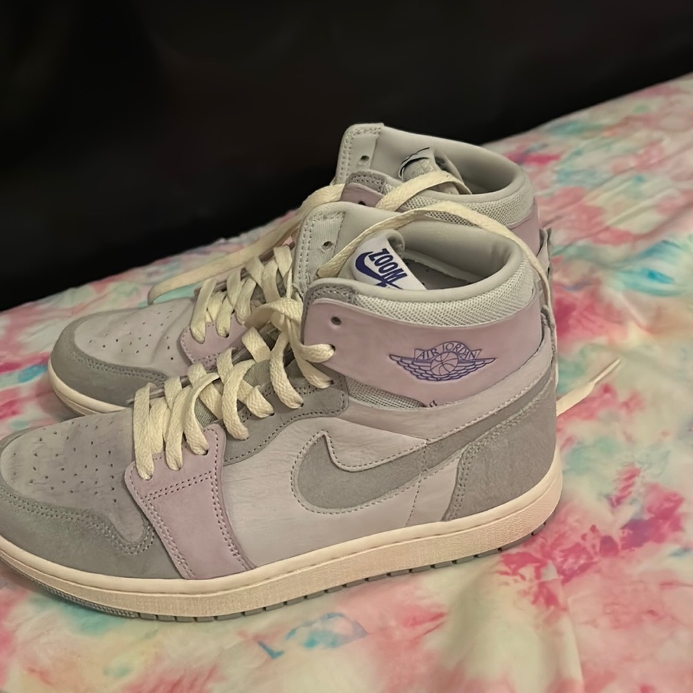 Cute gray and purple Jordan 1 comfort plus. They have beige laces.
